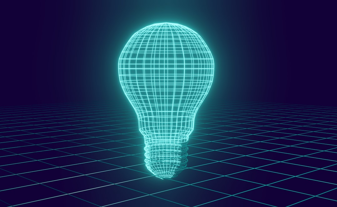 Home a-glowing-light-bulb-in-a-dark-room-2-kxlvgou5a